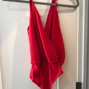 Red body suit